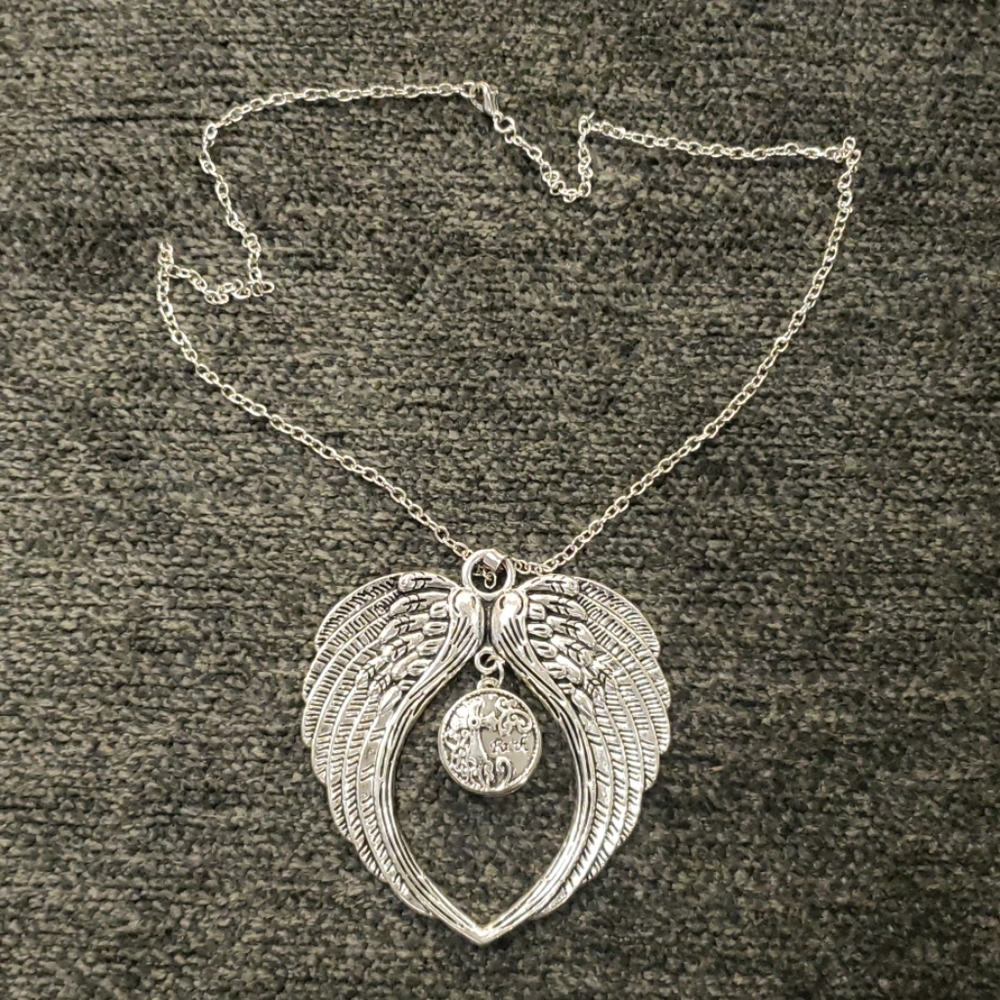 Funky angel wings faith necklace